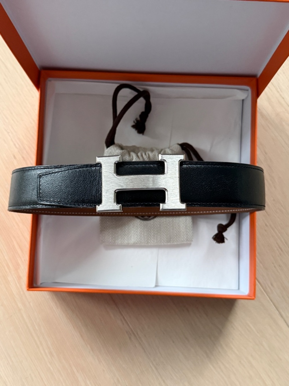 Hermes Reversible Leather strap Belt with Silver H Buckle. Black and Tan Edge